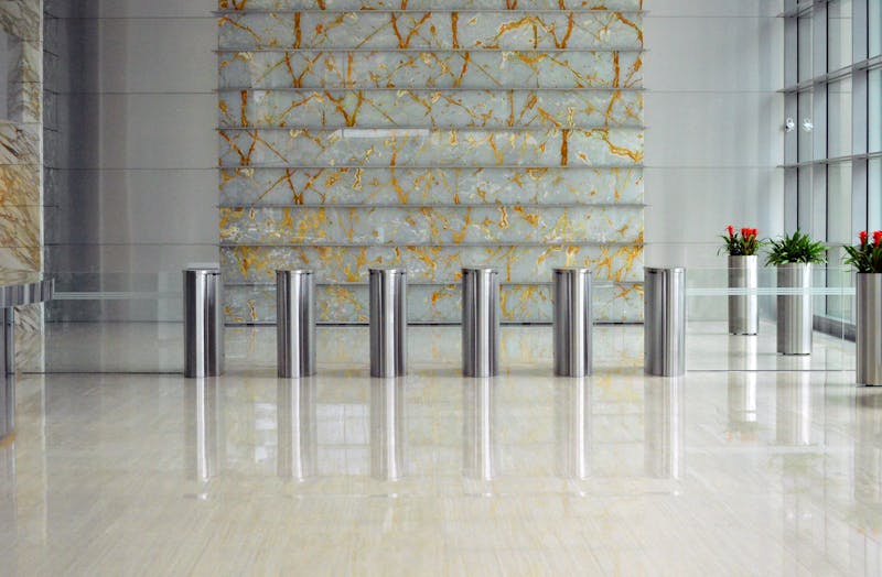 Corporate lobby with pristine marble finishes and glass architecture